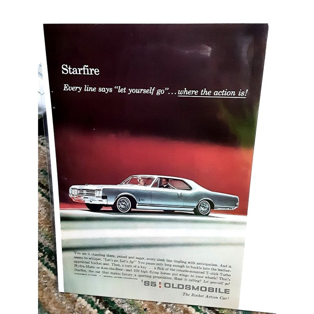 1965 Oldsmobile Starfire The Rocket Action Car Print Ad vintage 60s